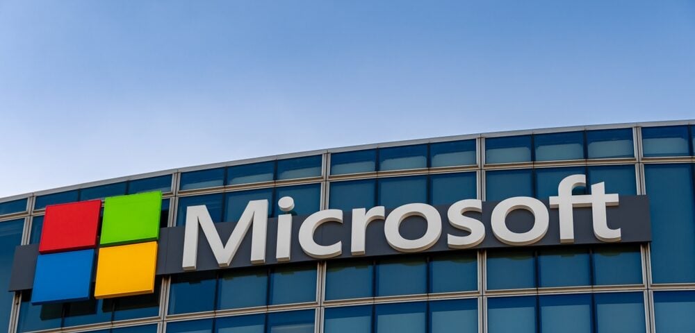 Microsoft logo on an office building, representing Microsoft Advertising and paid search marketing services.